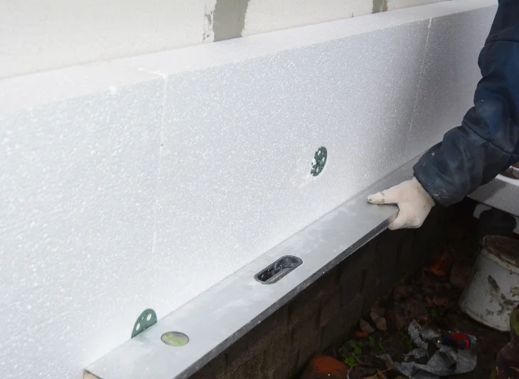 Schéma technique isolation extérieure montrant les couches d'une ITE